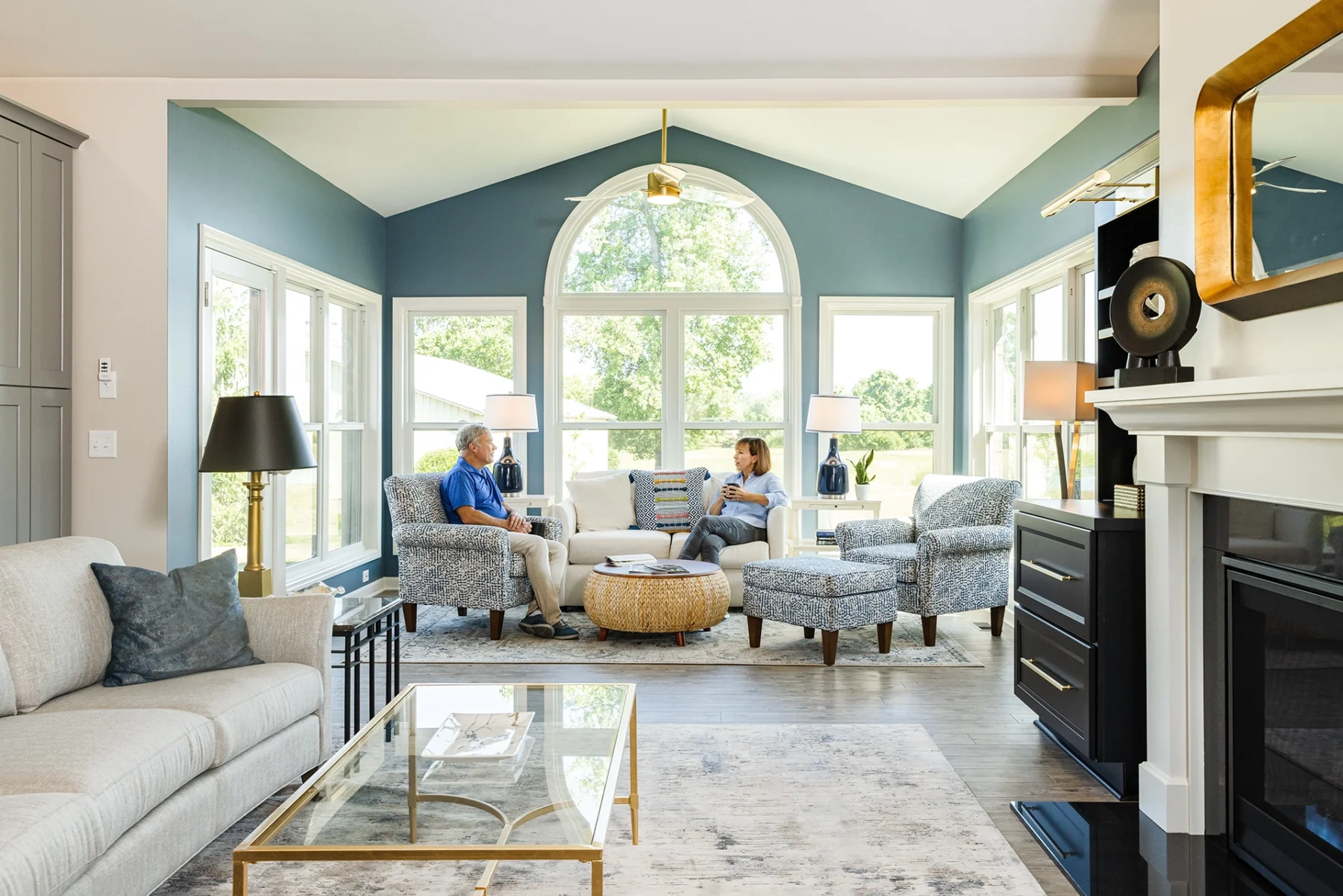Berkeley Square senior living couple talking in their modern independent living home's living space
